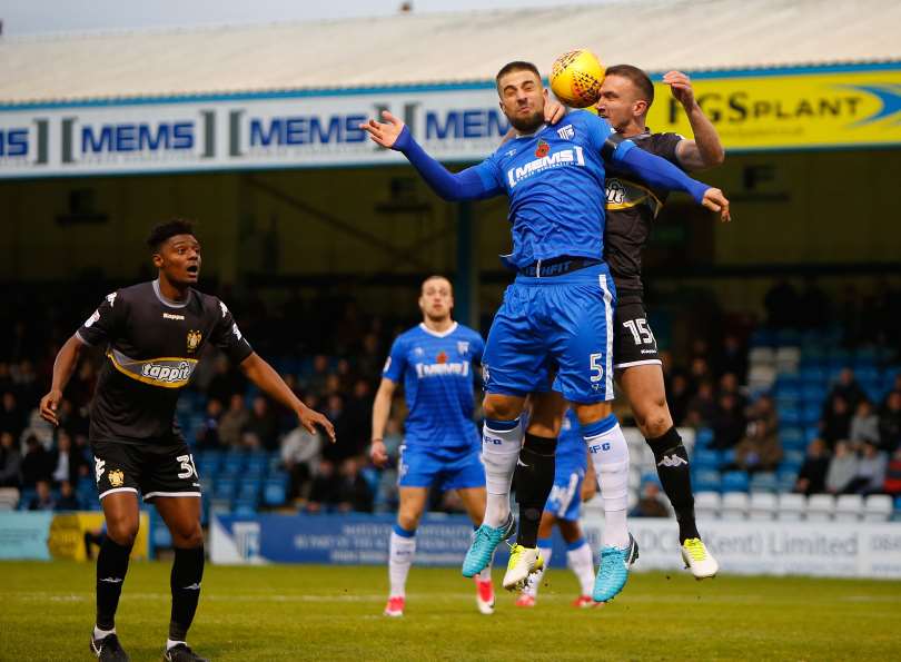 Max Ehmer challenges for the ball against Bury Picture: Andy Jones