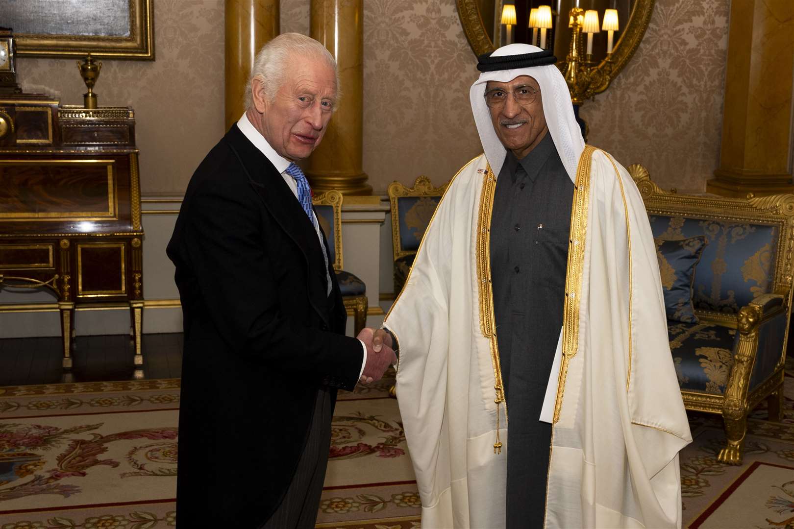 Qatari ambassador Sheikh Abdulla bin Mohammed bin Saud Al-Thani presents his credentials to the King at Buckingham Palace on Tuesday (Jordan Pettitt/PA)