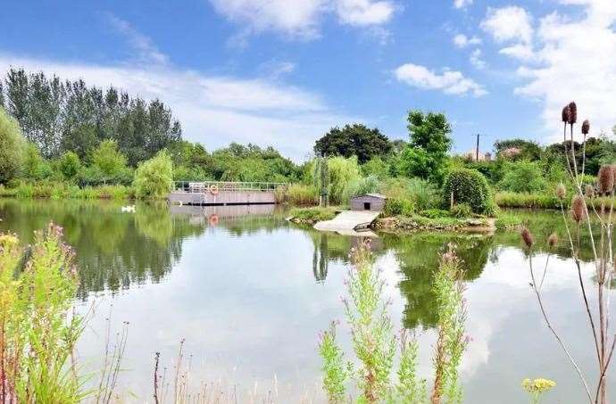 There is a lake, jetty and reservoir within the grounds. Picture: Fine and Country