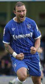 Danny Kedwell celebrates scoring Gillingham's equaliser