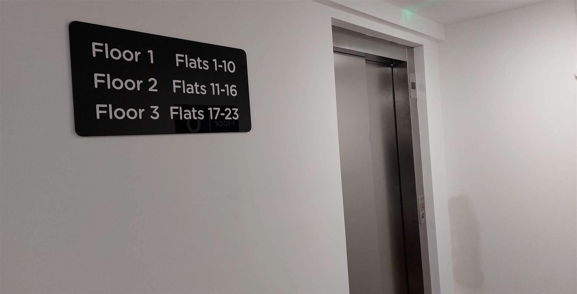 The apartment block has a lift which can access all three floors