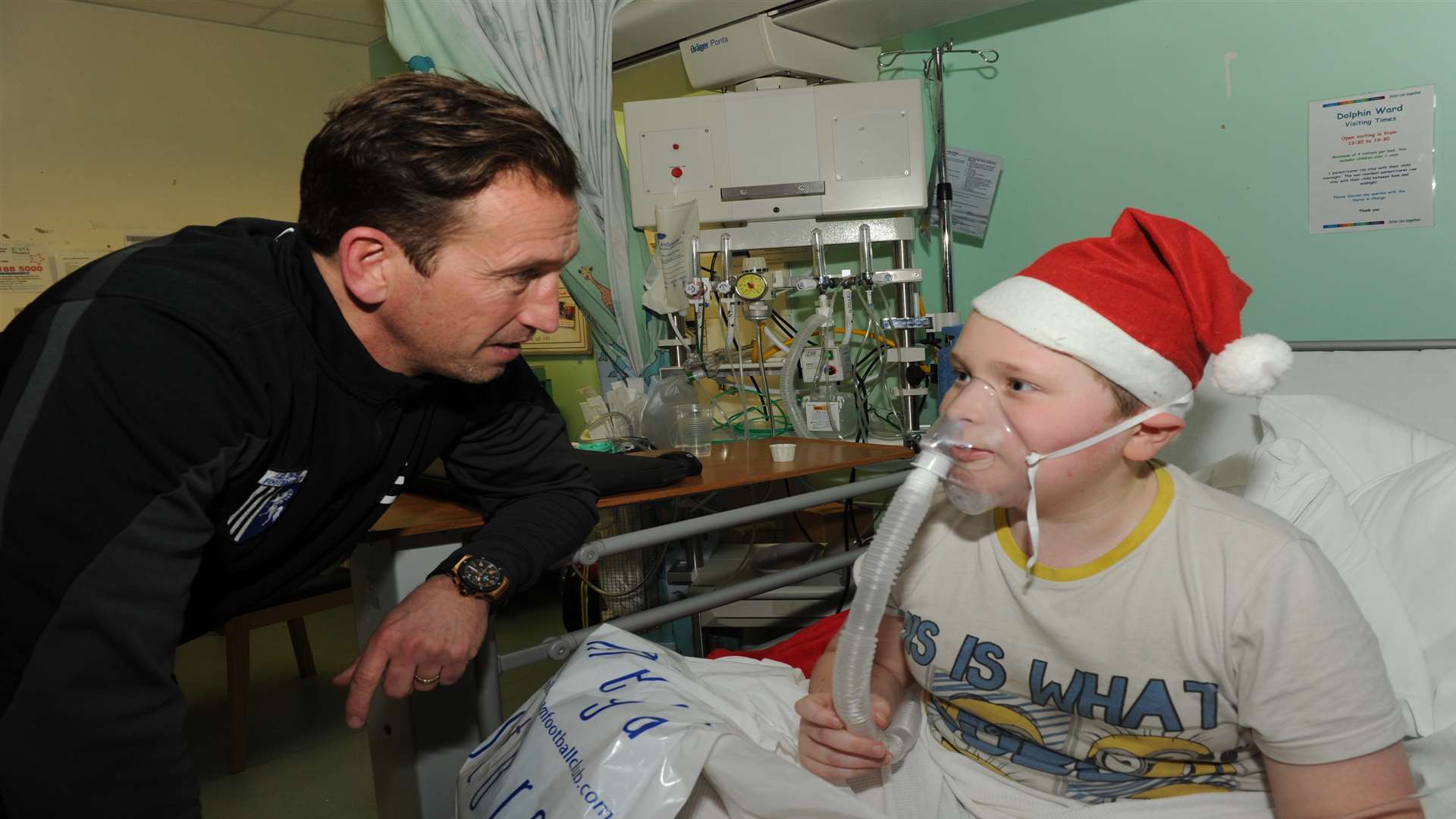 Ethan Larkins, 12, chats with Gills manager Justin Edinburgh