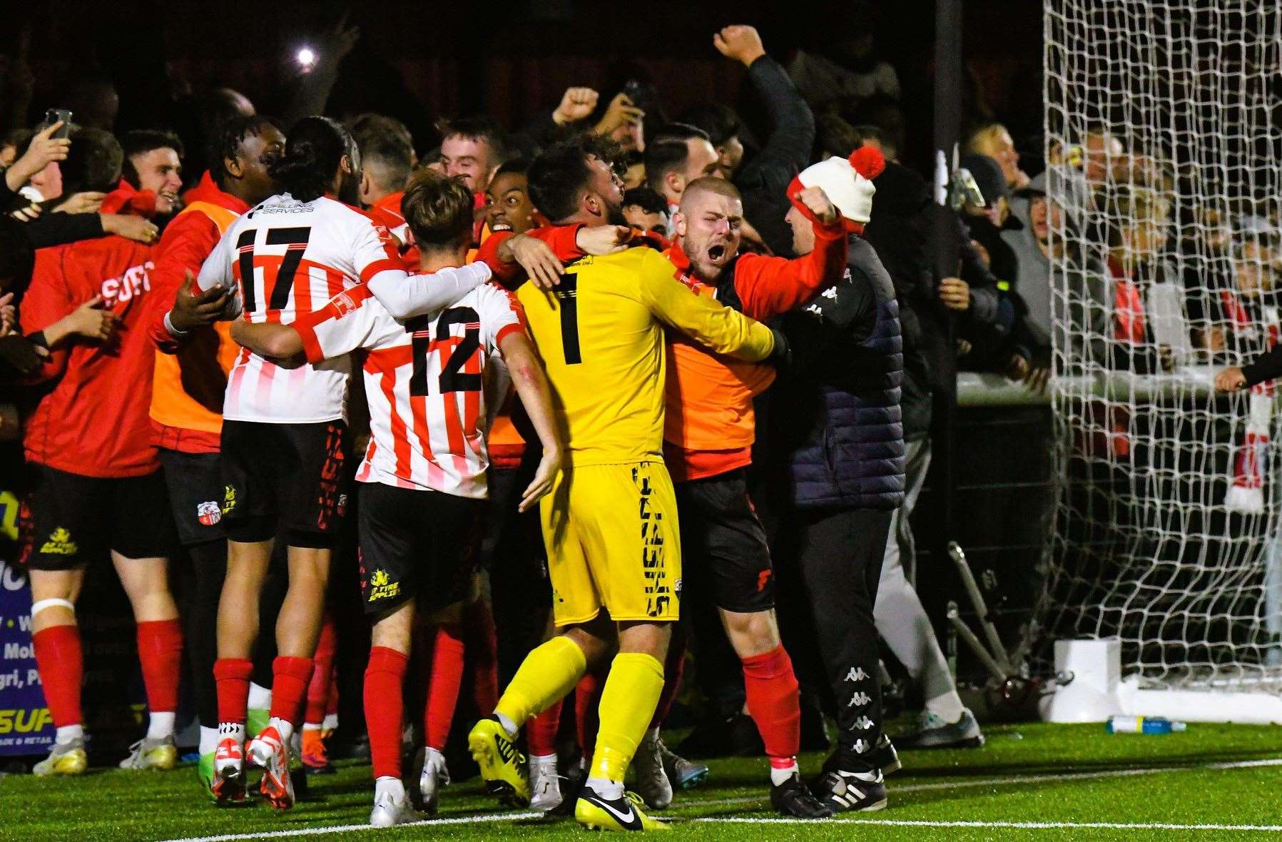 Sheppey substitute Dan Birch punches the air as they celebrate their 5-4 shoot-out victory after a 1-1 FA Cup replay draw on Tuesday night. Picture: Marc Richards