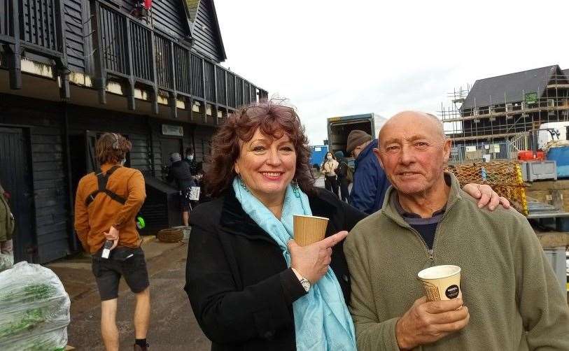 Julie Wassmer left London in 1999 and has embraced coastal life, pictured here with oyster fisherman Andy Riches