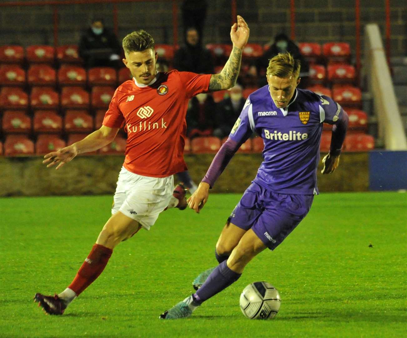 Ex-Maidstone favourite Jack Paxman does battle with Sam Corne in midfield Picture: Steve Terrell