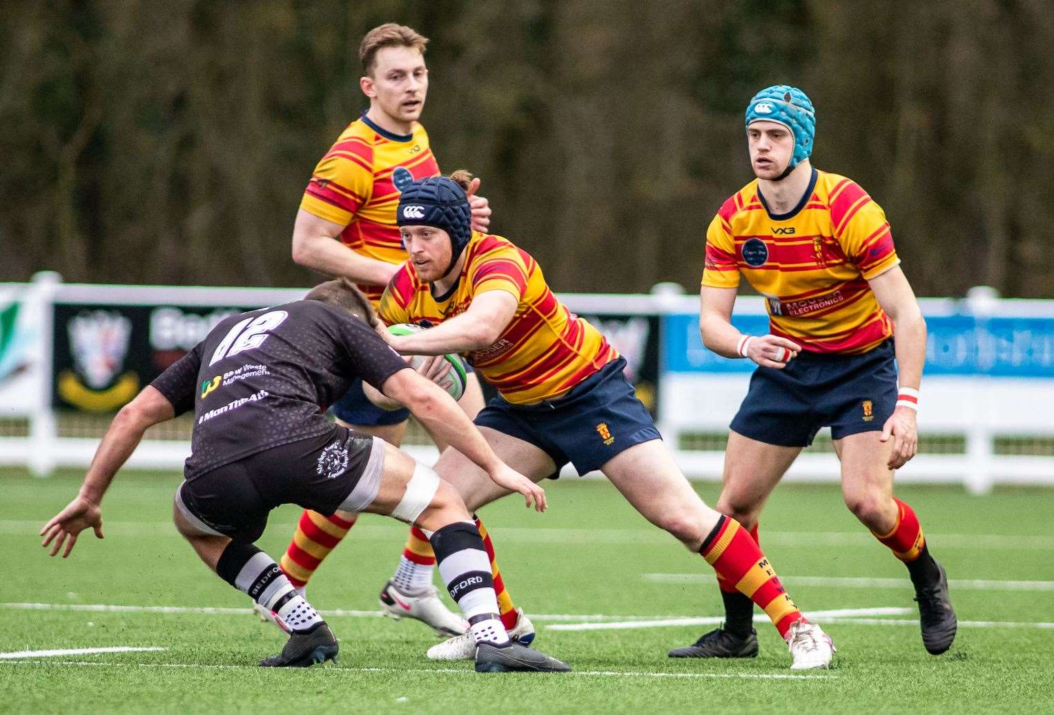 Medway's Sean Marriott sees off a tackle supported by Freddie Hayes and Conor Chalmers at Bedford. Picture: Jake Miles Sports Photography