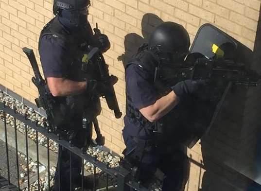 Armed police at a siege