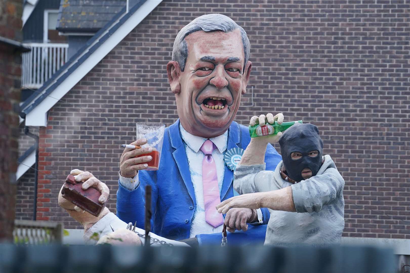 An effigy of Nigel Farage and a rioter featured at this year’s Bonfire Night event in Lewes, East Sussex (Gareth Fuller/PA)