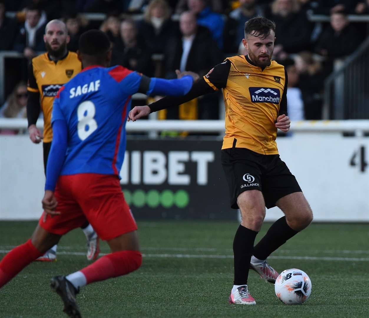 Regan Booty picks his pass against Dagenham on Monday. Picture: Steve Terrell