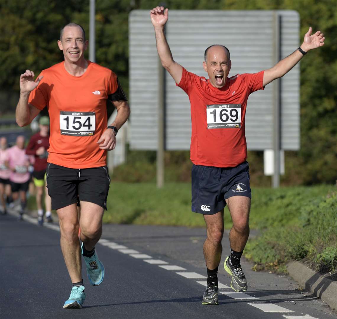 Carl Maisey (No.154) and Jerome Moisan (No.169) pick up the pace with a smile. Picture: Barry Goodwin (60032953)