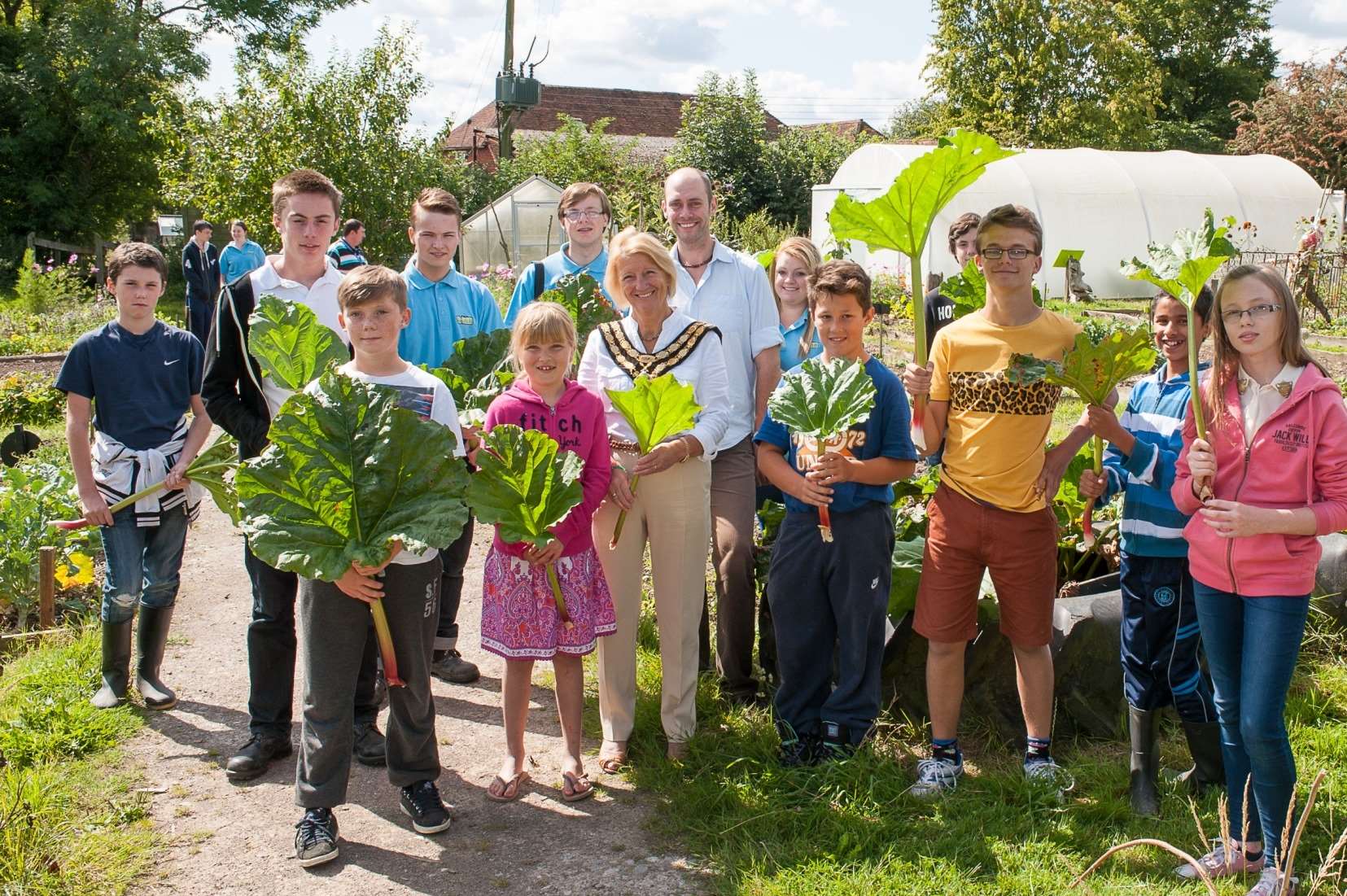 The Mayor, Cllr Sasha Luck, joins the Y2 Crew in the allotment to harvest the rhubarb for a home made crumble