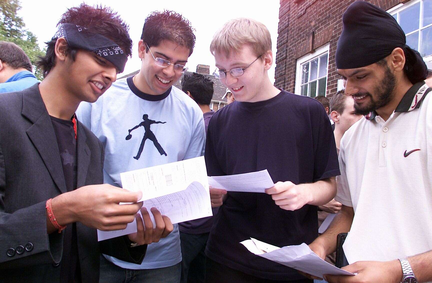 A level results day at Gravesend Grammar School for Boys featuring Sahir Kara, Satvinder Singh Sandu, James Rolls and Gurdeep Singh Mann (left to right). Picture: Richard Eaton