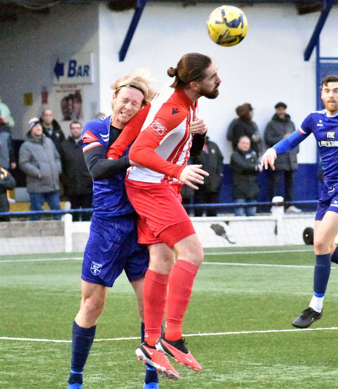 Folkestone's Tom Derry beats home player Ellis Ashworth in the air. Picture: Randolph File