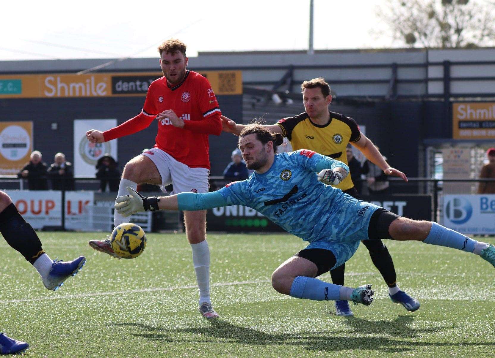 Chatham debutant Harvey Bradbury is denied by Cray Wanderers keeper Shaun Rowley on Friday Picture: Max English @max_ePhotos