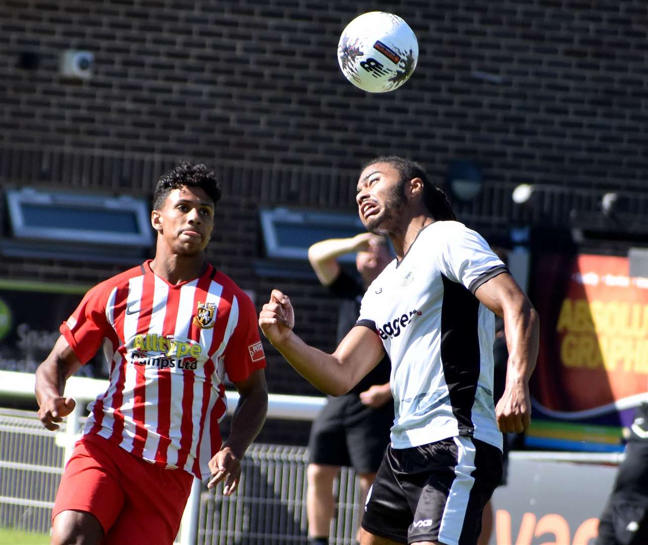 A Dover man tries to control the ball with his head. Picture: Randolph File