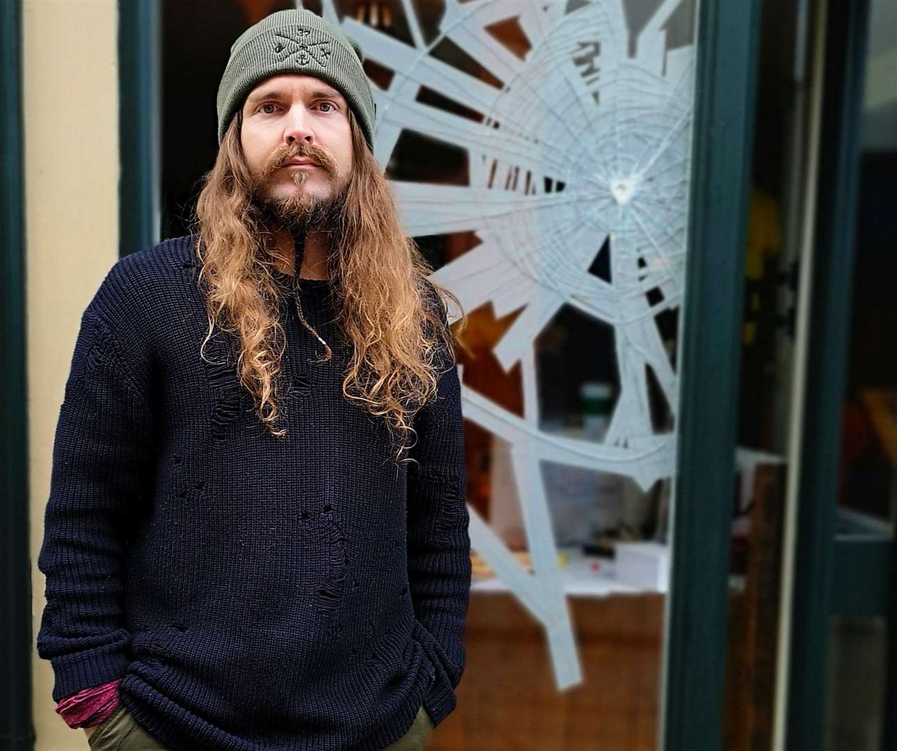 Colin White outside his shop, The Quarter Masters, which suffered criminal damage last Thursday