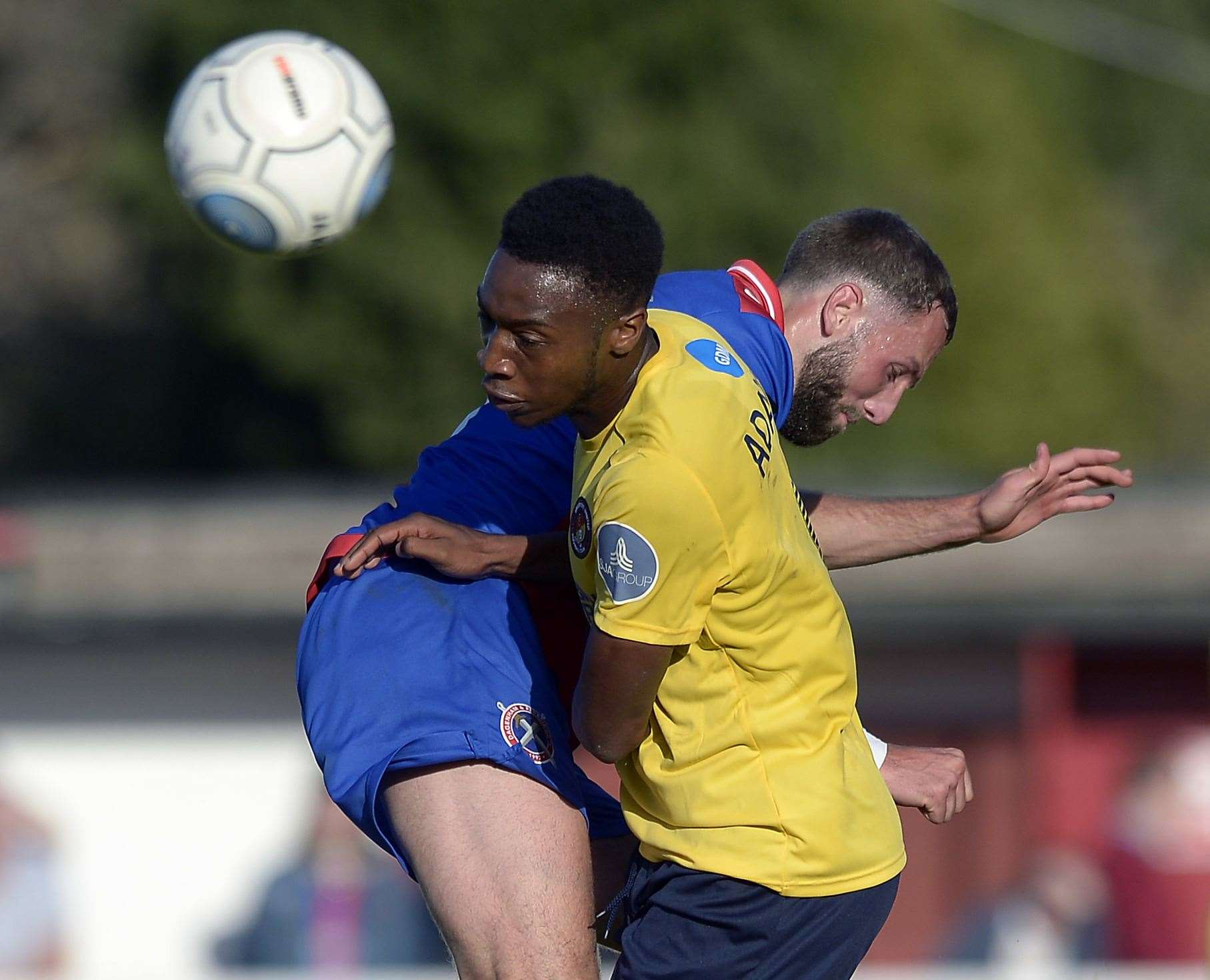 Luke Pennell (blue/red) in action for Dagenham against Ebbsfleet Picture: James Griffiths