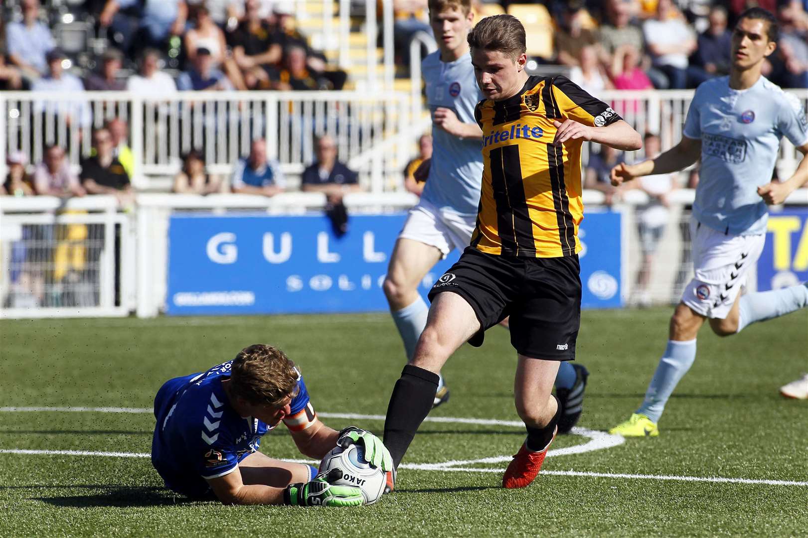 Jake Embery is thwarted by Braintree keeper Ben Killip at the Gallagher on Good Friday Picture: Sean Aidan