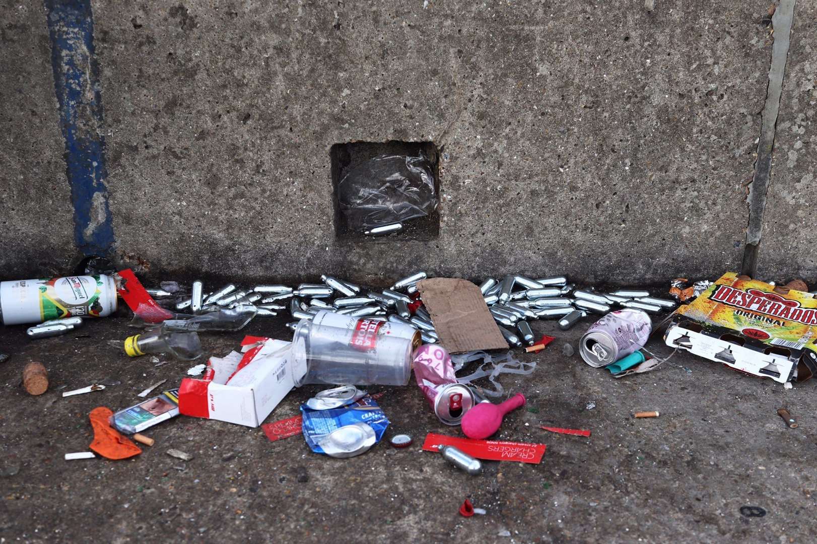 Laughing gas cannisters were strewn across the ground. Picture: Alex Hughes