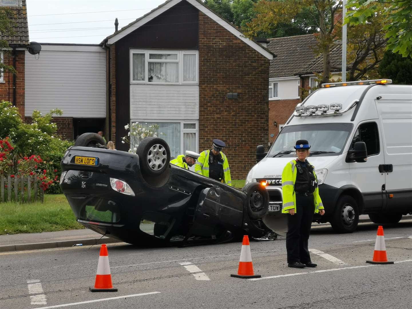 The Peugeot on its roof on Brookfield Road. Picture: Alan Bourne (12143868)