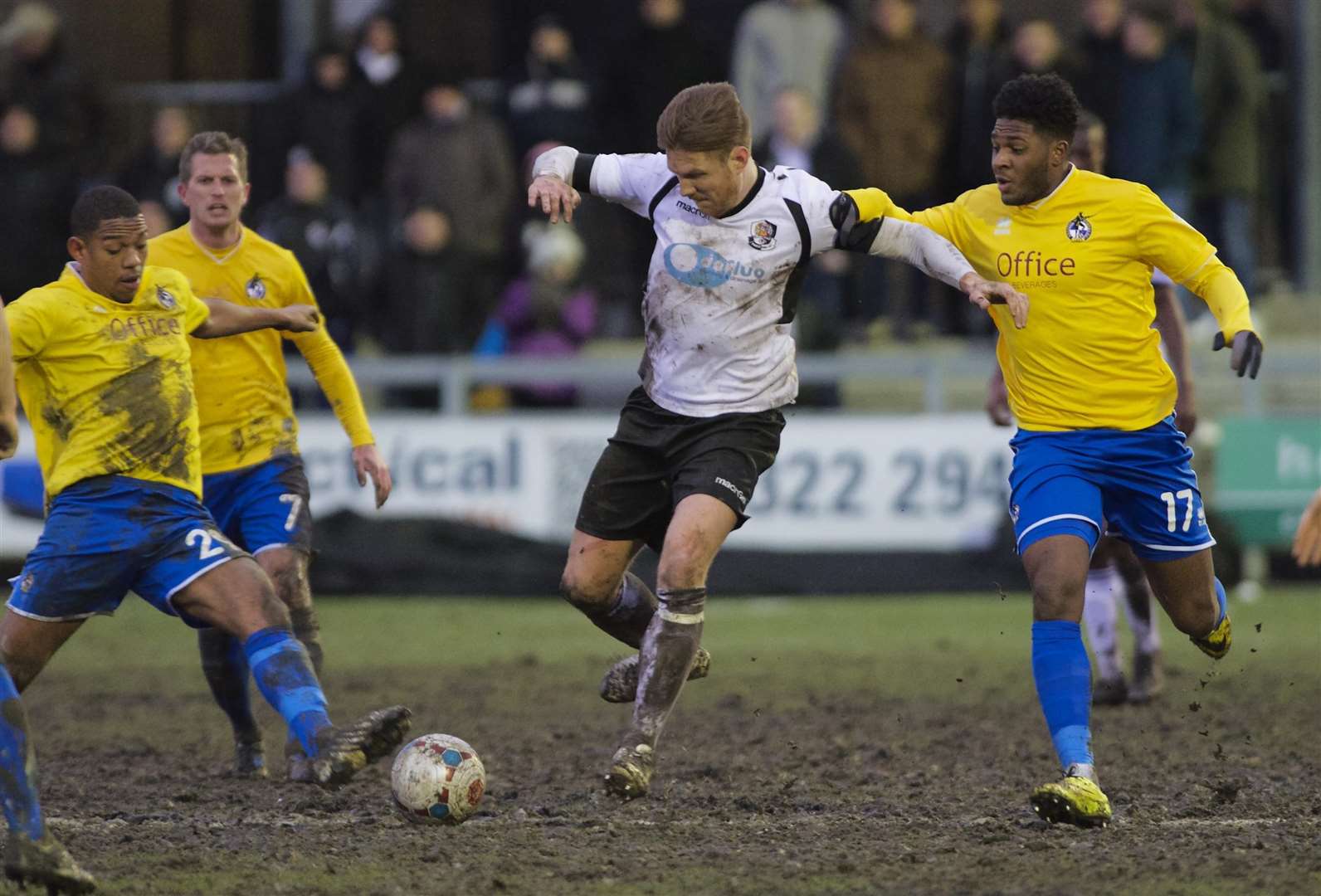 Elliot Bradbrook ploughs through the mud against Bristol Rovers Picture: Andy Payton