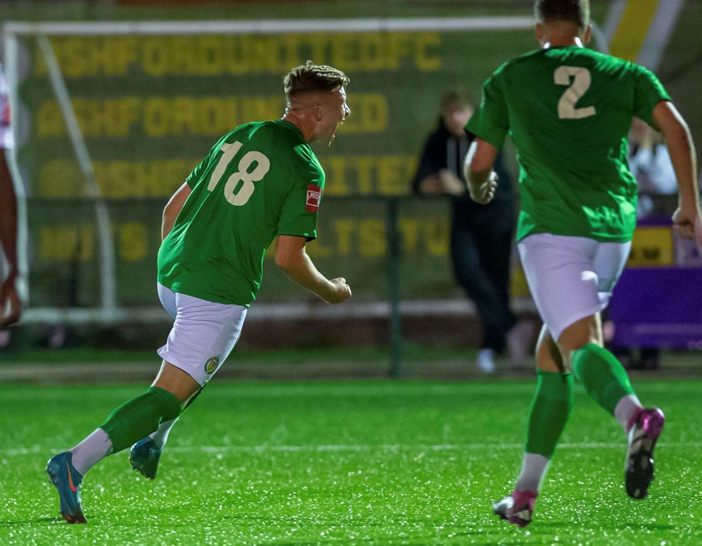 Jack Saunders (No.18) celebrates scoring for Ashford United in Friday night’s 2-2 draw with Margate. Picture: Ian Scammell