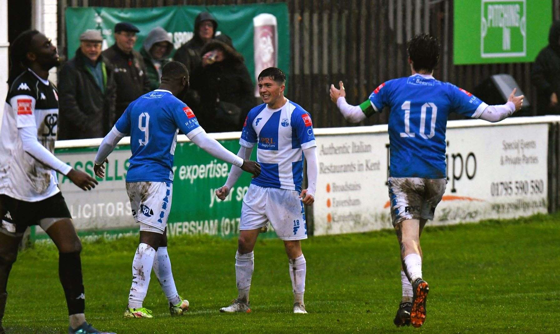 Sheppey's Warren Mfula and Frankie Morgan celebrate during their Swale Isthmian South East derby victory at Faversham. Picture: Marc Richards