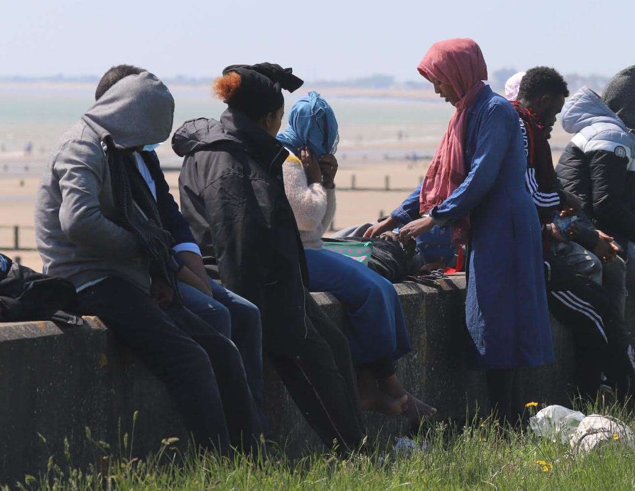 Some of the asylum seekers at Dymchurch yesterday. Submitted picture