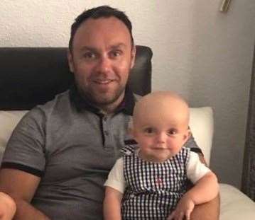 Dan Heritage, pictured with his son Joshua, was knocked off his bike last week (29415117)