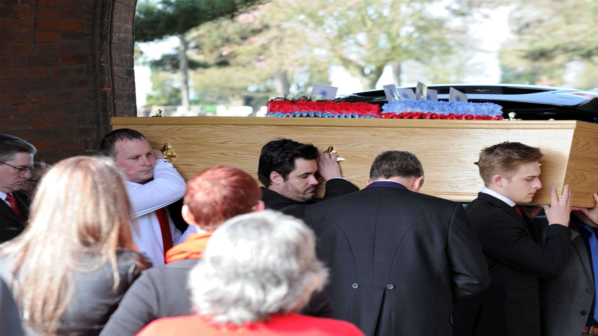 Ben Savage's coffin is carried at Strood Cemetery