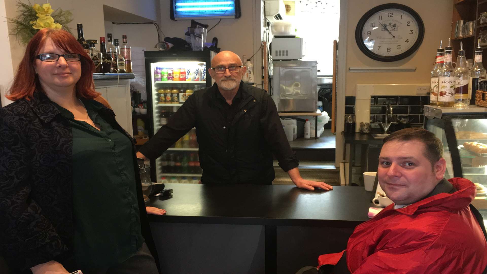 Cllrs Palmer and Zosseder surveying business people on car parking. They are with Glenn Fifield of the Mean Bean cafe in Dover. Picture: Peter Wallace