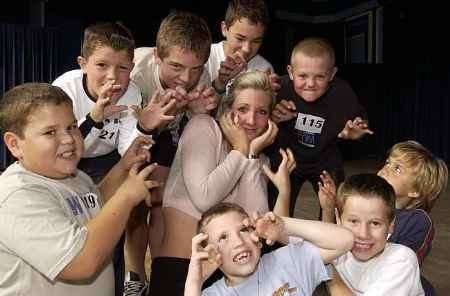 Emmanuelle Carvell with some of the young rats. Picture: JOHN WARDLEY