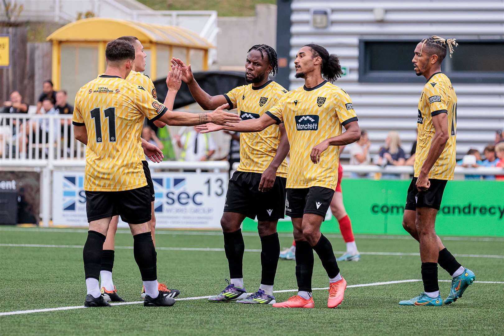 Shaq Coulthirst, centre left, scored twice in Maidstone's 3-0 friendly win over Whitehawk. Picture: Helen Cooper