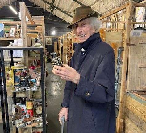 Tom Baker delighted staff by posing with a Dalek. Picture: Sid's Emporium