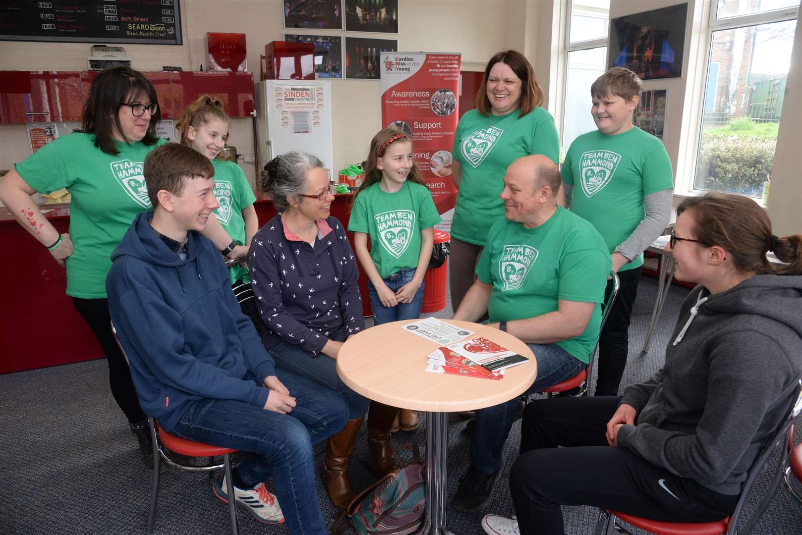 Steve Hammond and his team chat with parents and teenagers at Homewood School