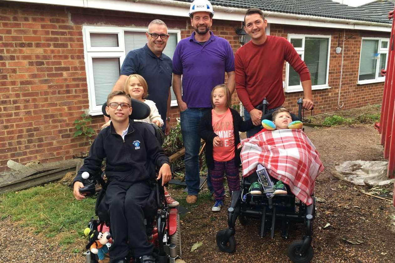 The Ratcliffe family with DIY SOS presenter Nick Knowles