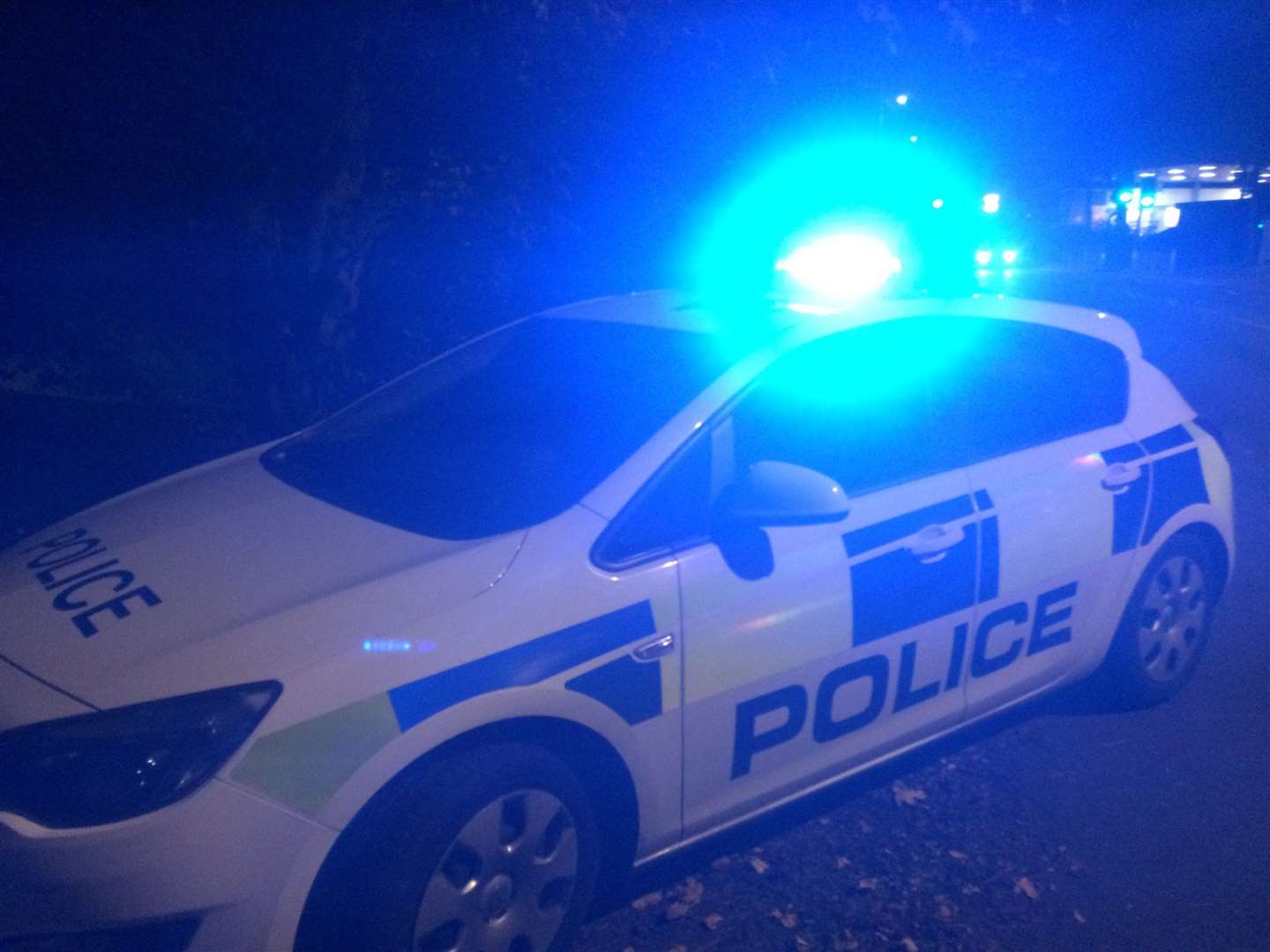 A police car was torched in a suspected arson attack. Stock Picture