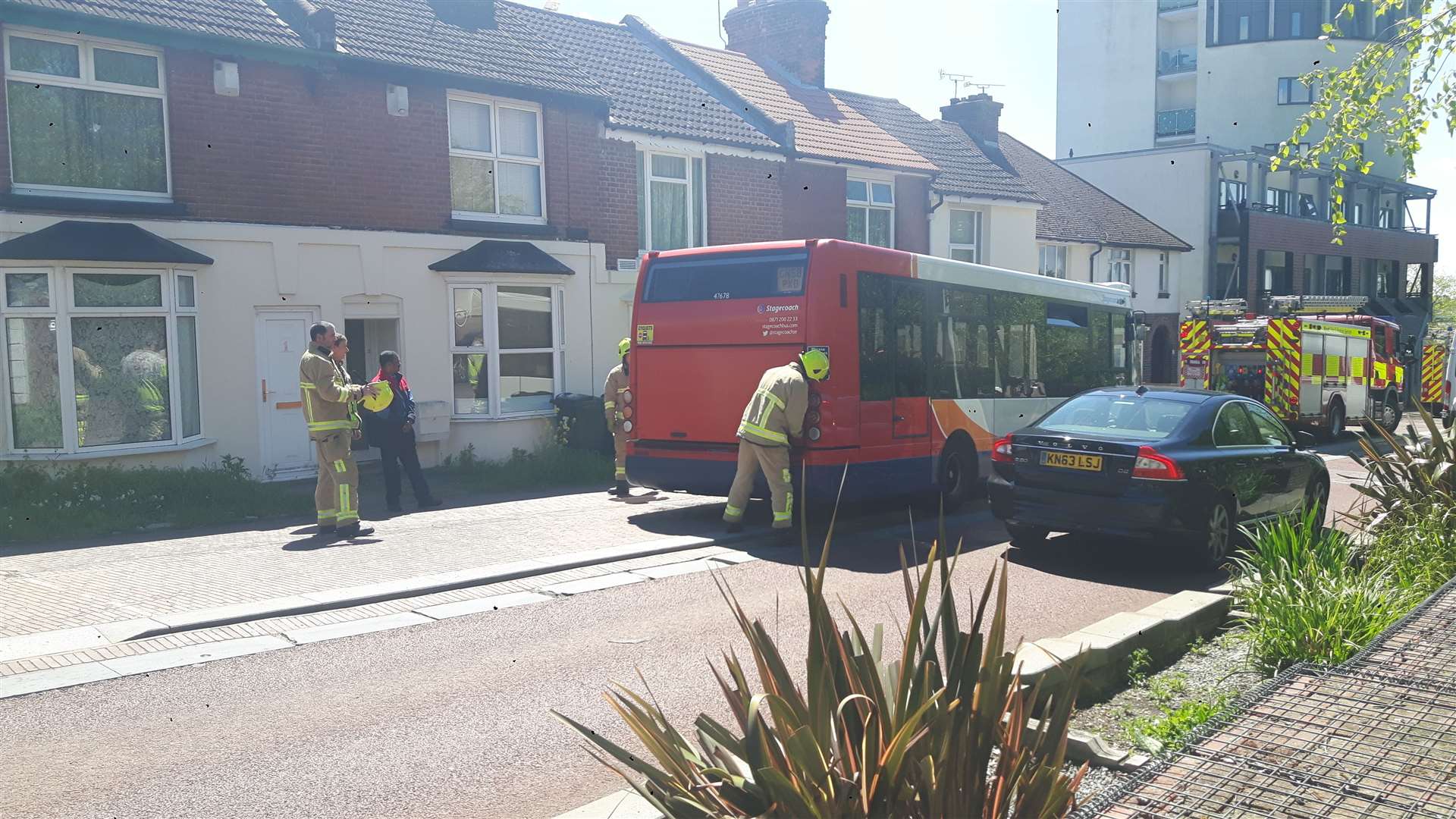 Fire crews open the back of the Stagecoach bus to assess the cause. (10197735)