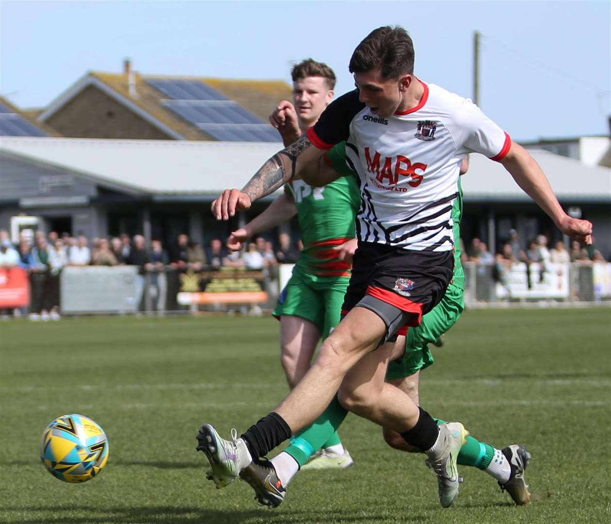 Teenager Jamie Kennedy shoots at goal for Deal. Picture: Paul Willmott