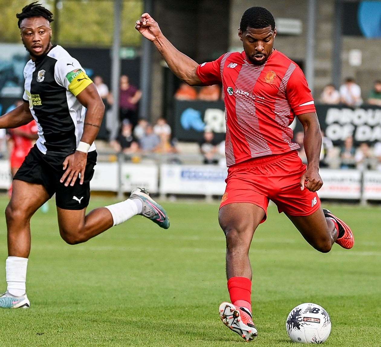 New Welling striker Tristan Abrahams attempts to get away from Dartford's Joash Nembhard. Picture: Dave Budden