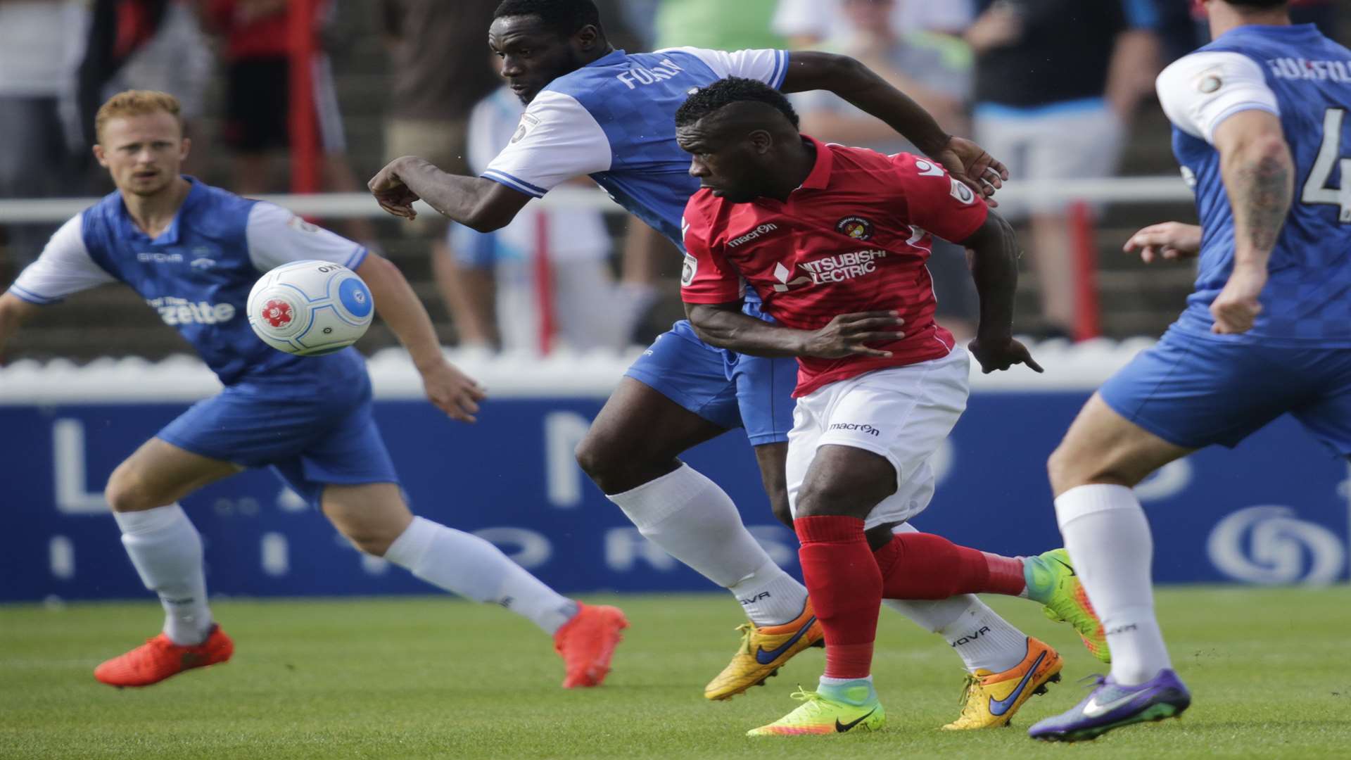 Ebbsfleet's Aaron McLean takes on three Margate defenders Picture: Martin Apps