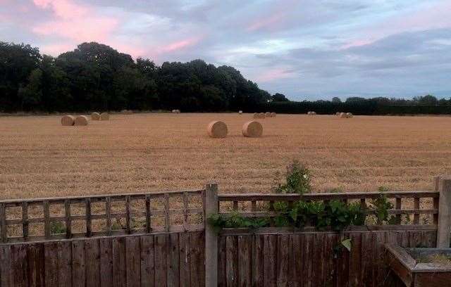 Quite why they felt the need I’m not sure, but a gaggle of girls ran into the field at one point to push apart the nearest pair of cylindrical bales