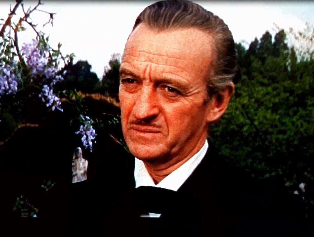 David Niven as Sir James Bond in Casino Royale