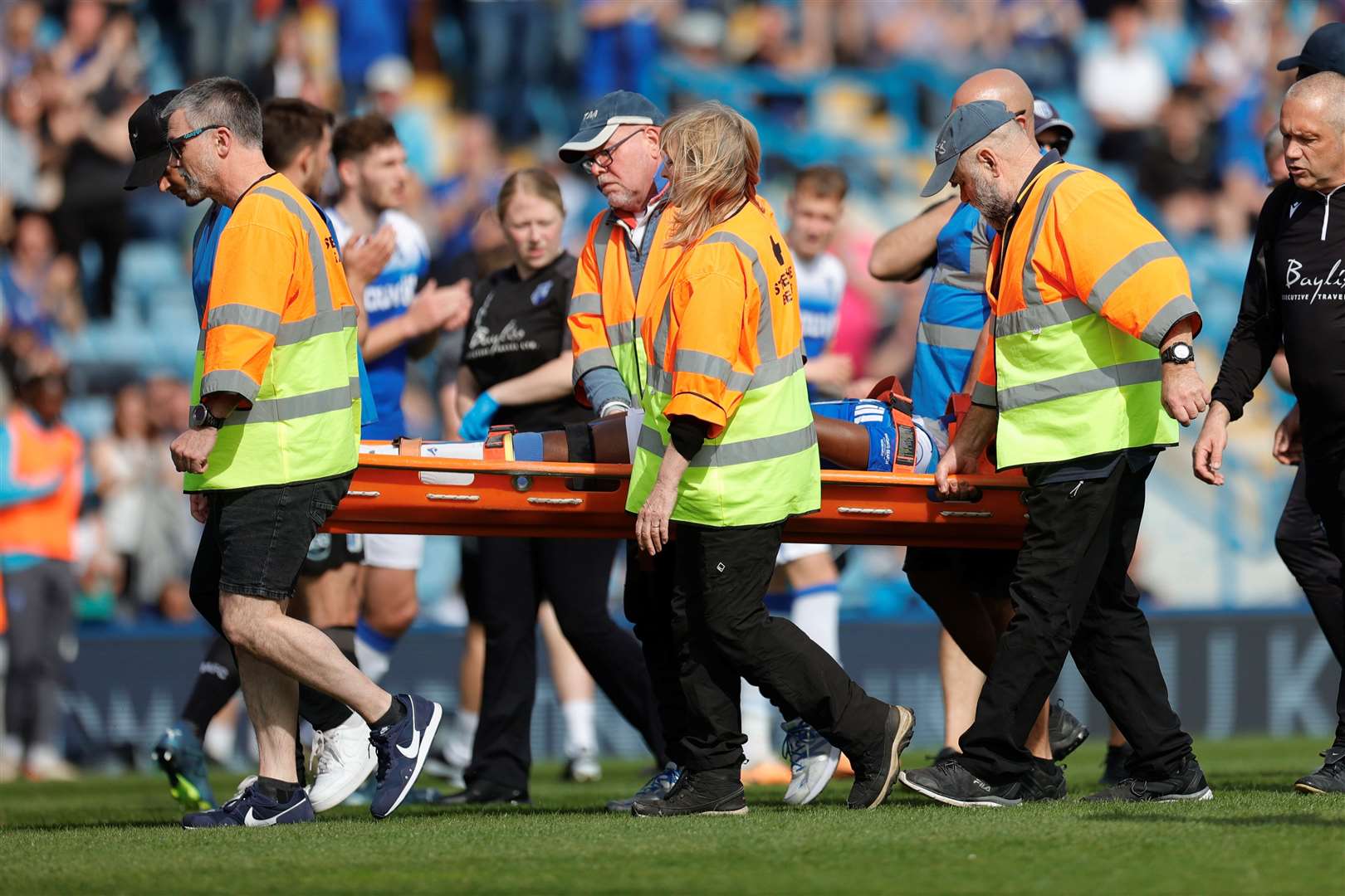 Josh Walker taken off injured Gillingham v Barrow Picture: Beau Goodwin