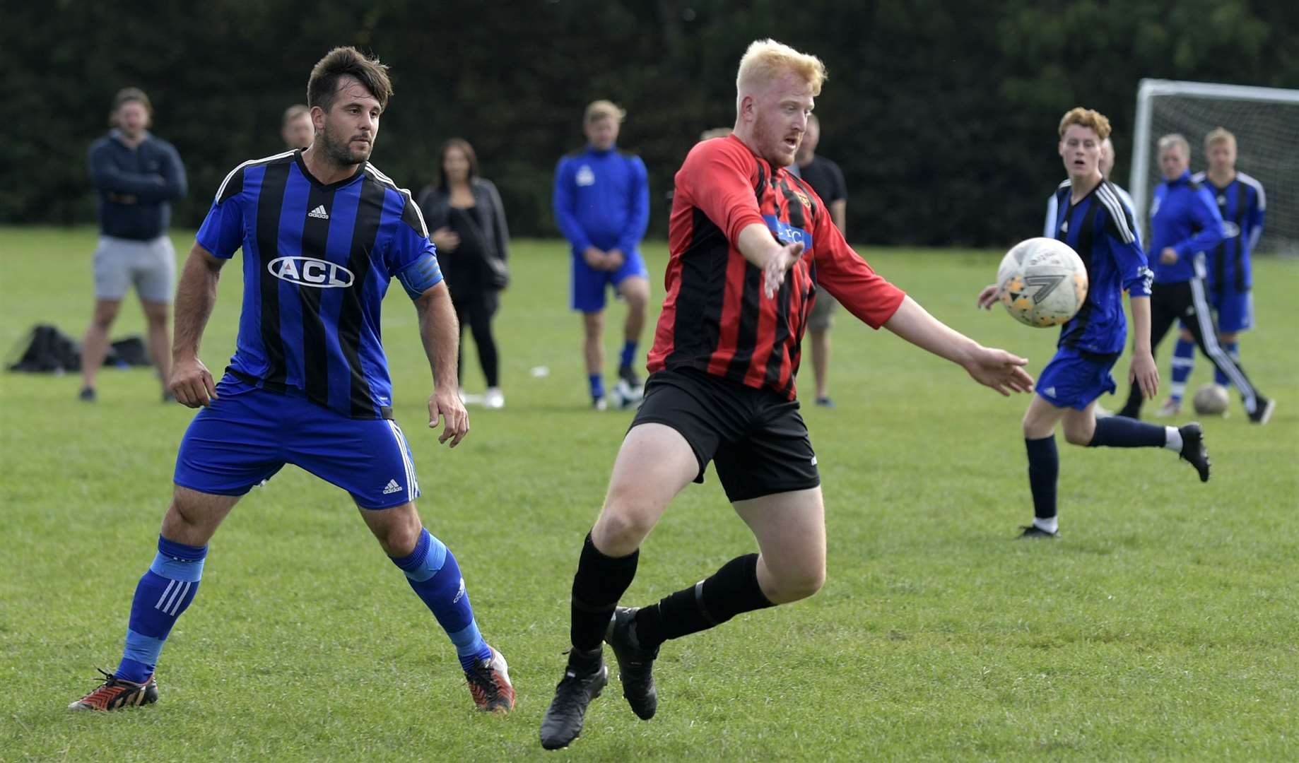 Rainham 84 (red) hold the ball up against Quested in the Senior Section. Picture: Barry Goodwin FM42034526