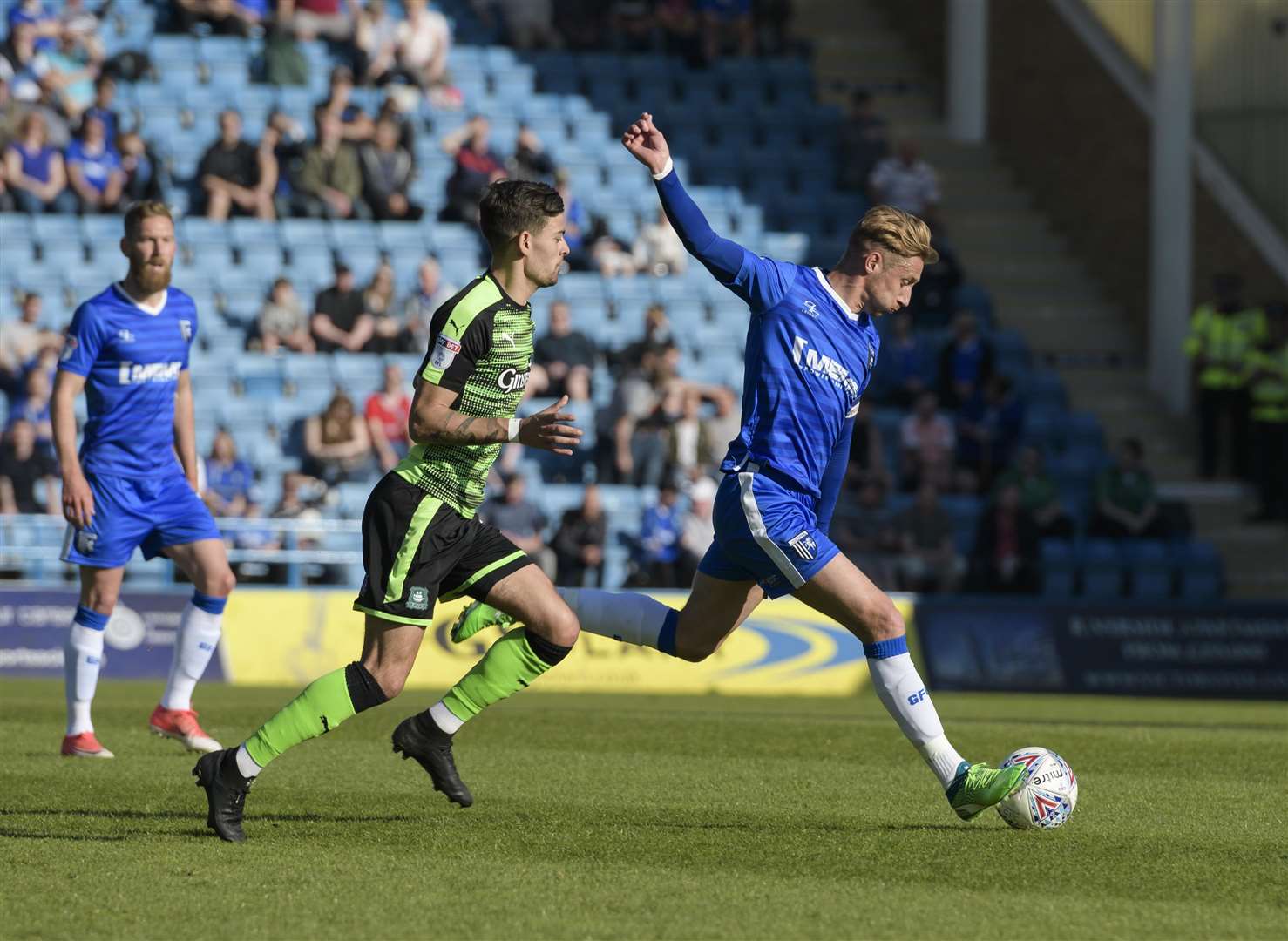 Lee Martin aims a cross Picture: Andy Payton