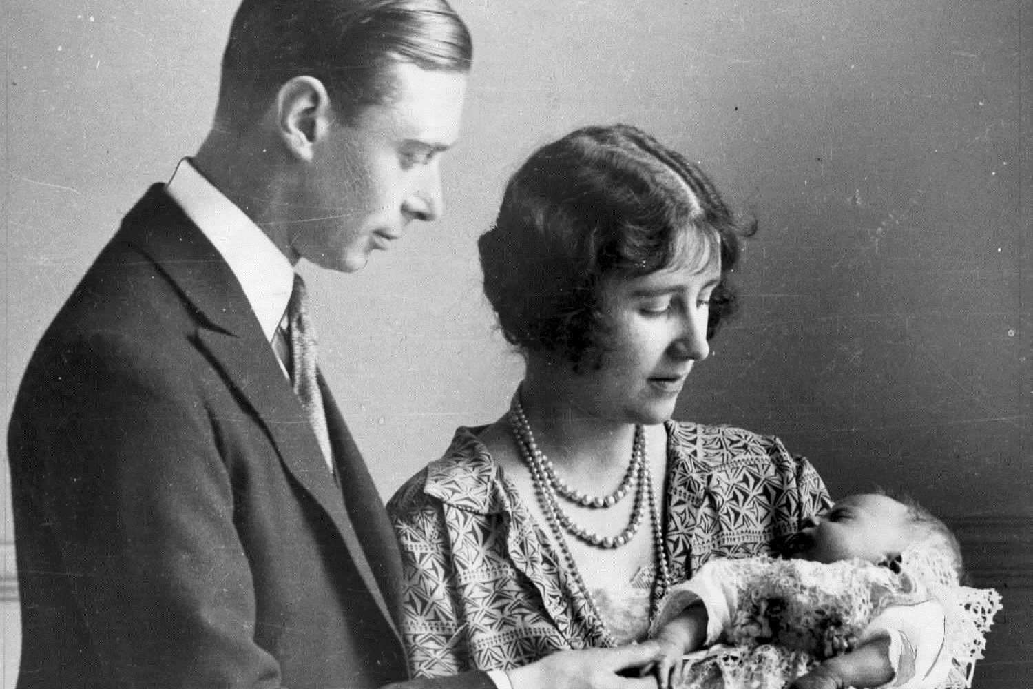 Her Majesty the Queen as an infant with her mother and father.