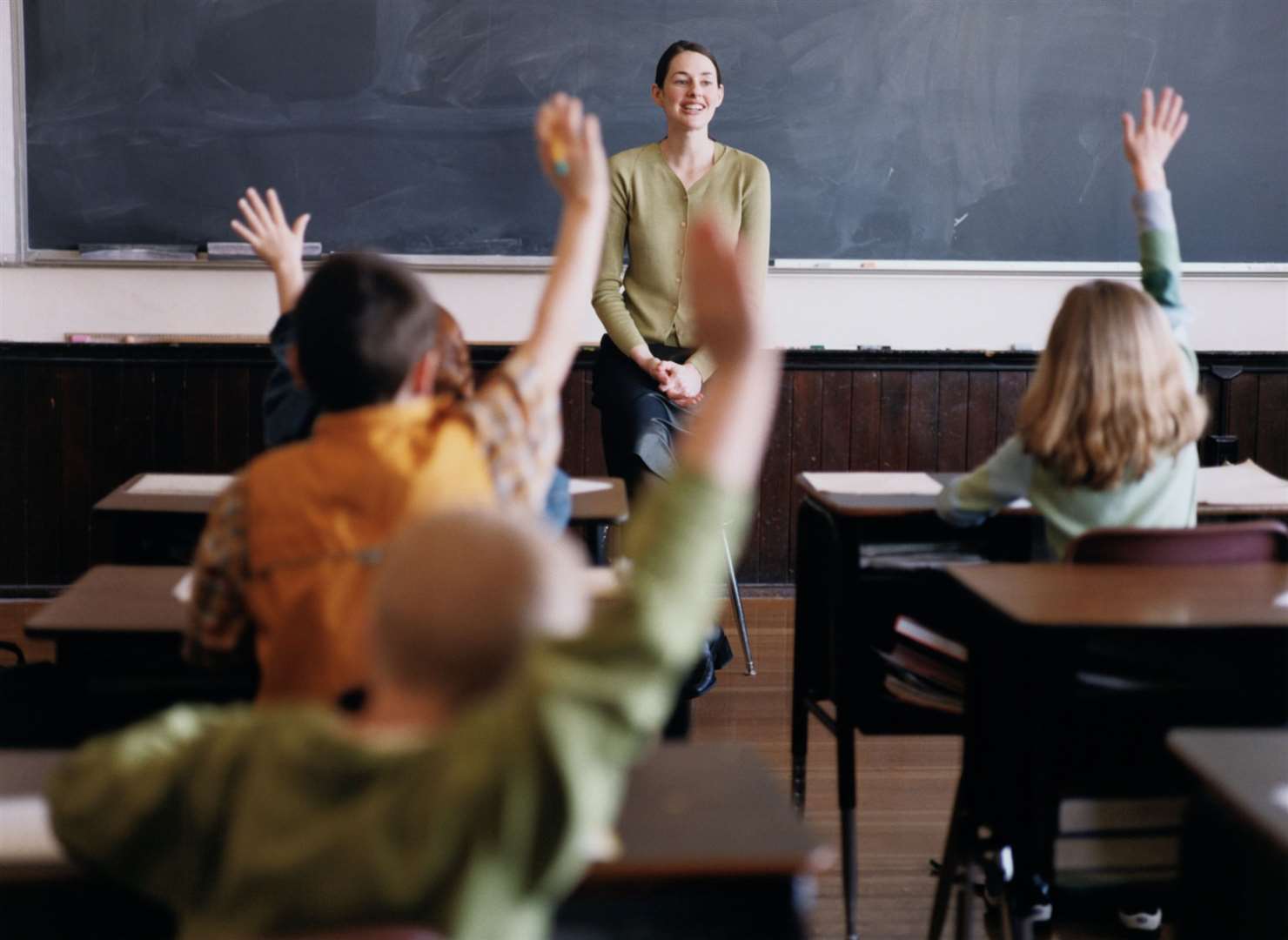 A teacher in front of class of children. Stock picture: Ryan McVay/Think Stock