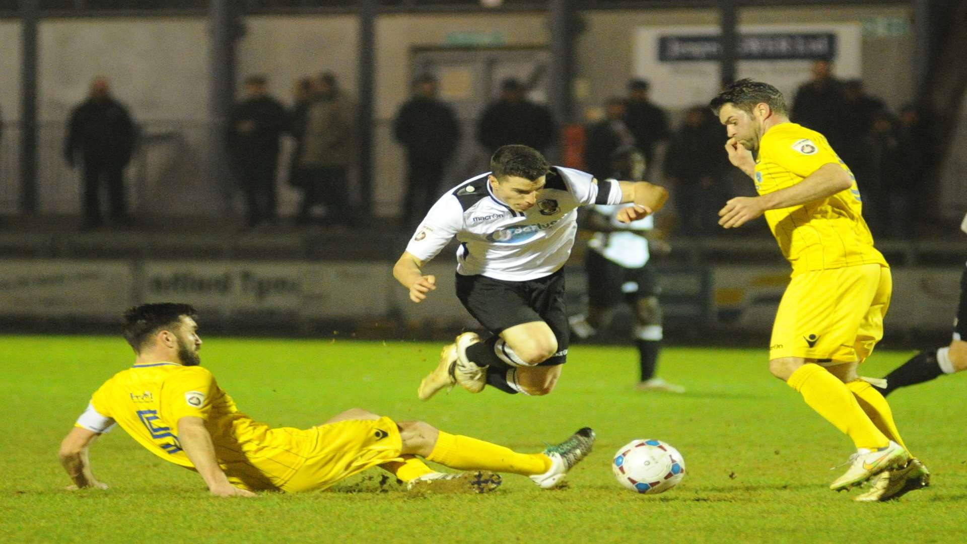 Dartford's Jack Simmons is challenged by Wealdstone captain Thomas Hamblin Picture: Steve Crispe