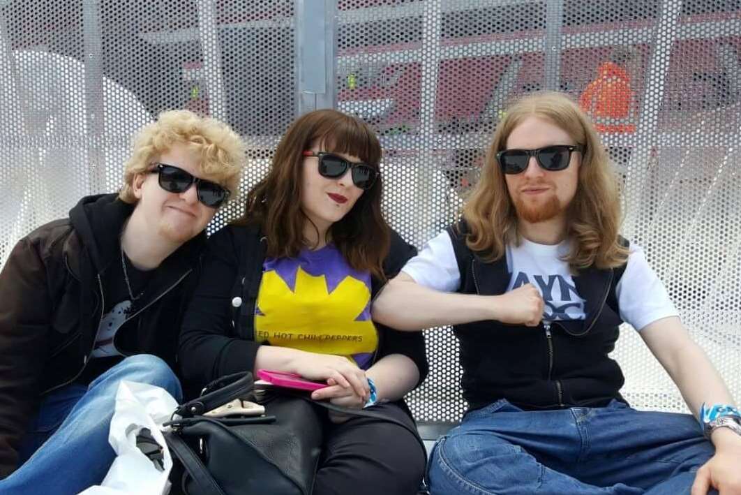 Faye Rogerson with her younger brother Niall, left, and brother Liam, right,